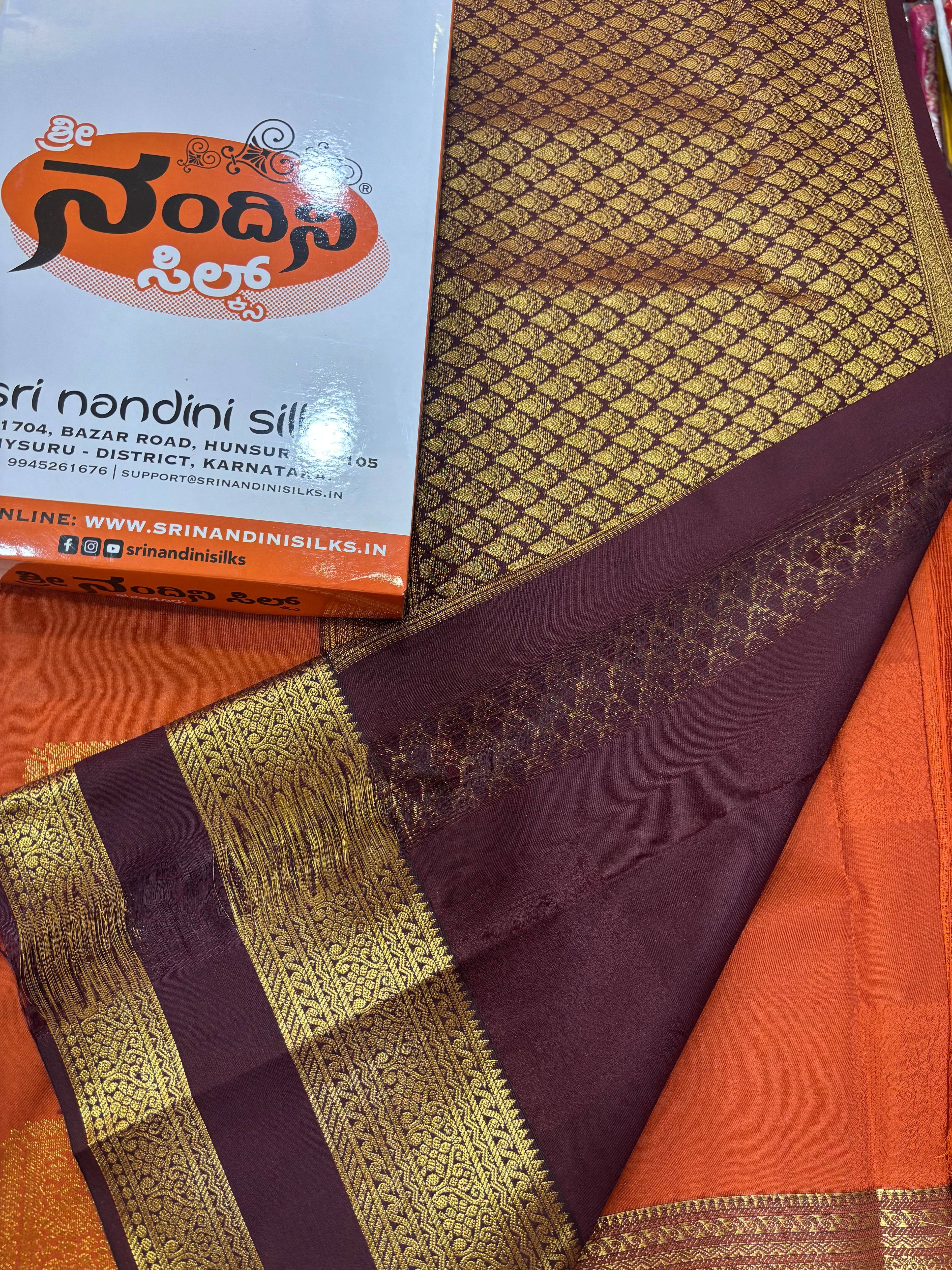 Trending Rust Orange and Brown Kanchi Semi Silk Saree (NHM5816)