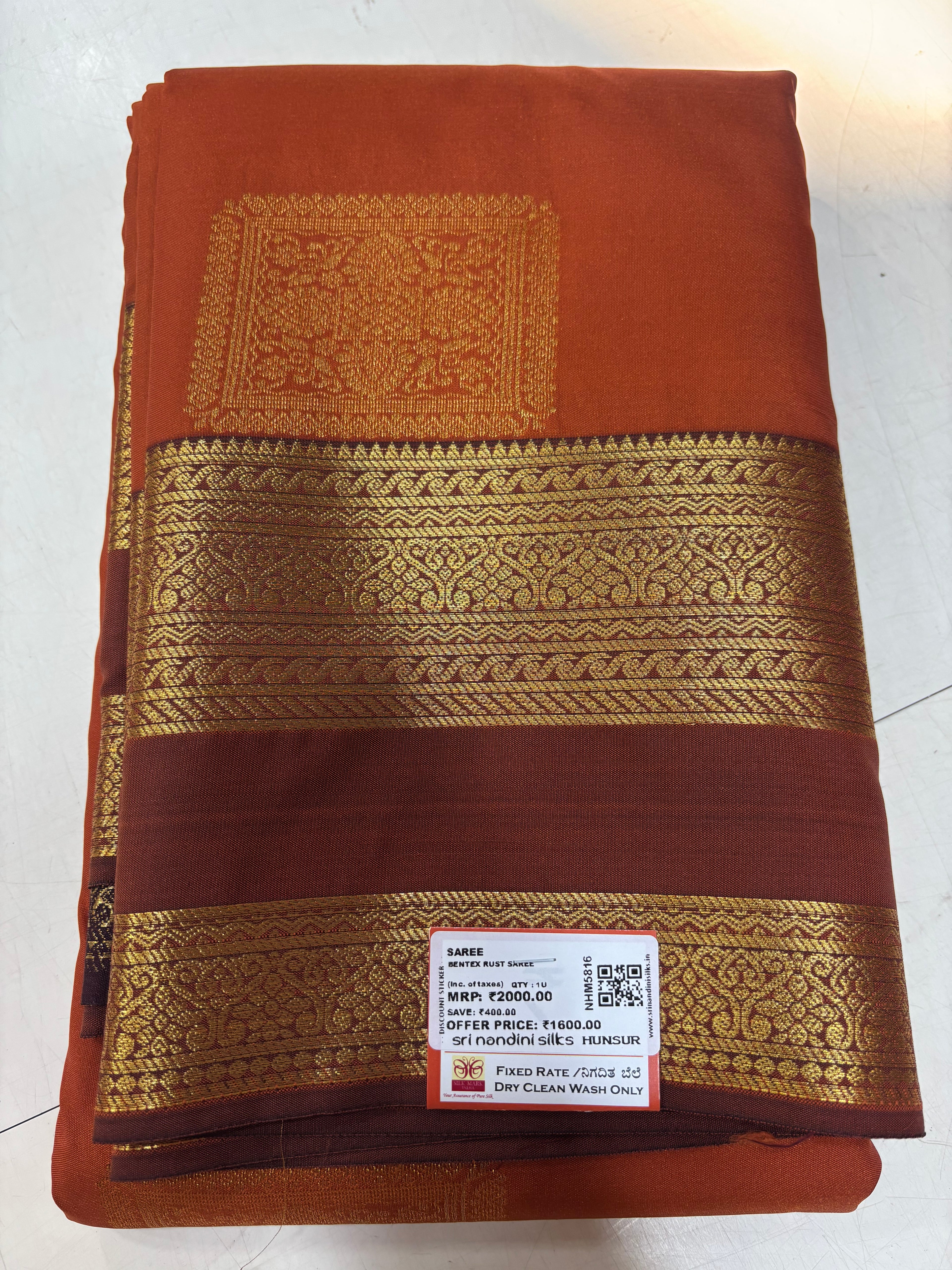 Trending Rust Orange and Brown Kanchi Semi Silk Saree (NHM5816)