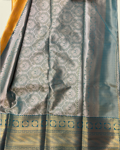 Trending Golden Soft Tissue with Contrast Teal Green Border Saree (NHM7045_1)