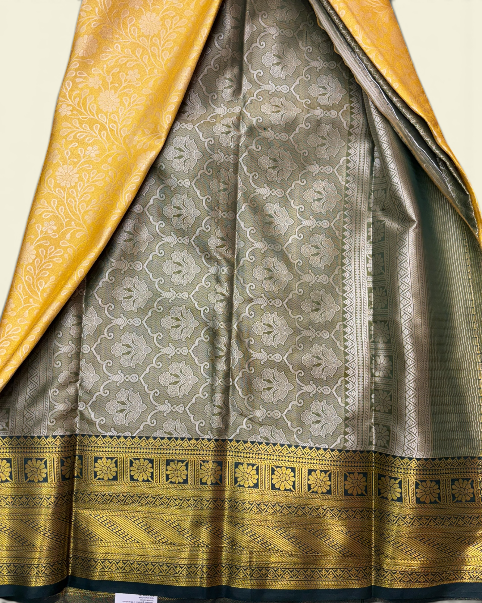 Trending Golden Soft Tissue with Contrast Green Border Saree (NHM7045_3)